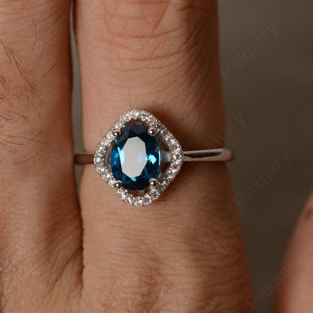Oval Cut London Blue Topaz Flower Ring - Palmary