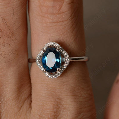 Oval Cut London Blue Topaz Flower Ring - Palmary