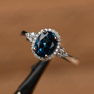 Oval Cut London Blue Topaz Halo Engagement Rings - Palmary