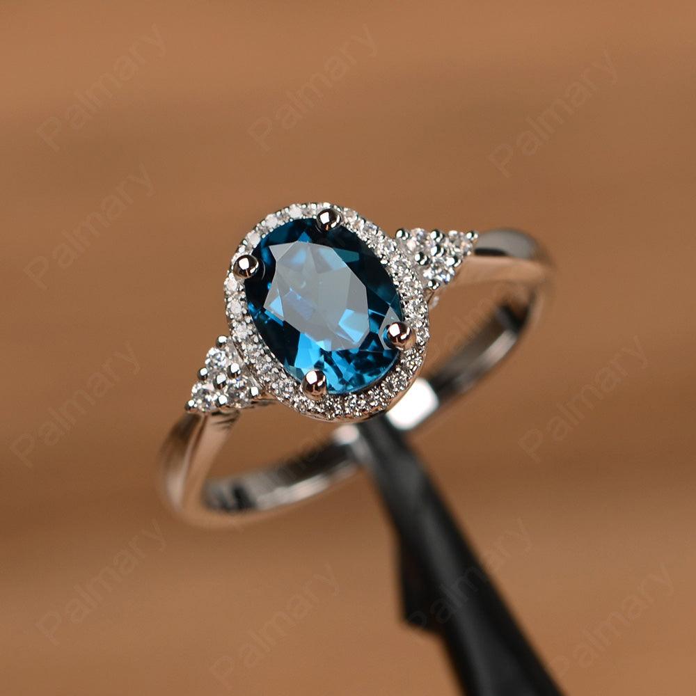 Oval Cut London Blue Topaz Halo Engagement Rings - Palmary