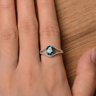 Oval Cut London Blue Topaz Split Rings - Palmary