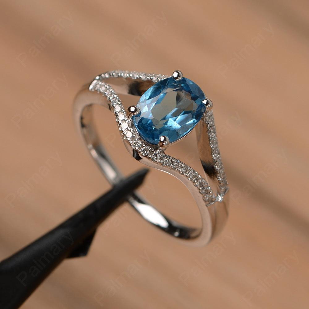 Oval Cut Swiss Blue Topaz Split Rings - Palmary