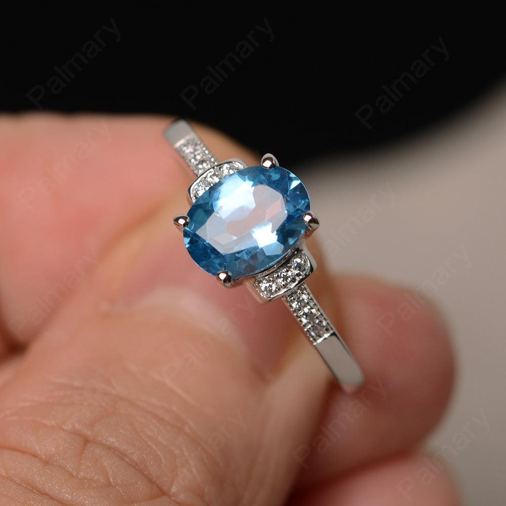 Oval Cut Swiss Blue Topaz Promise Rings - Palmary