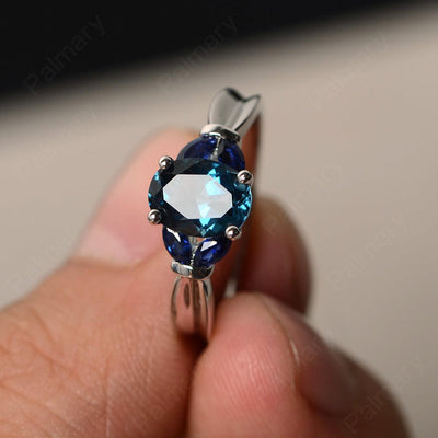 Oval Cut London Blue Topaz Vintage Engagement Rings - Palmary