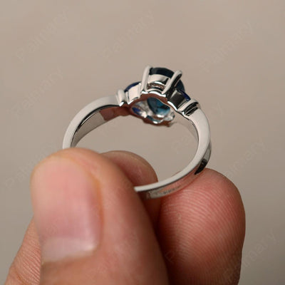 Oval Cut London Blue Topaz Vintage Engagement Rings - Palmary