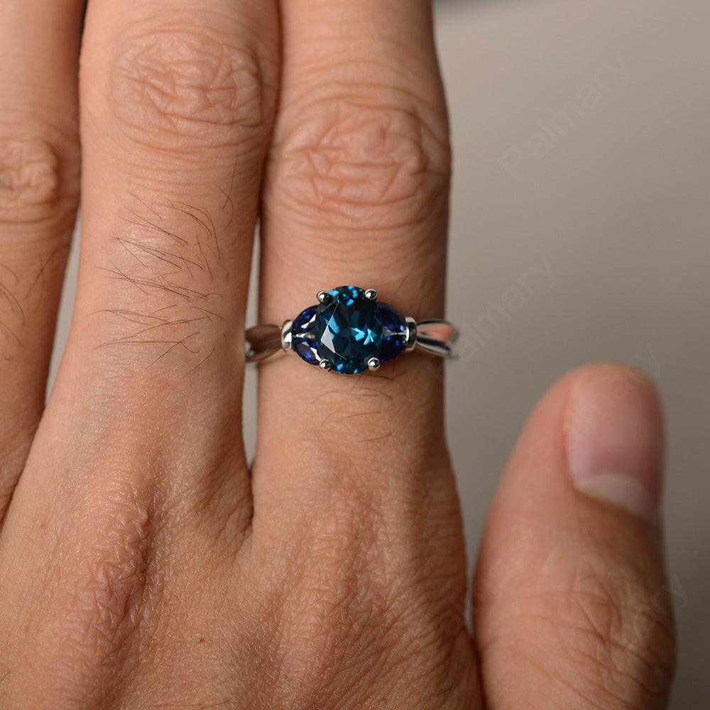Oval Cut London Blue Topaz Vintage Engagement Rings - Palmary
