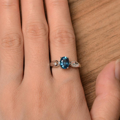 Oval Cut London Blue Topaz Wedding Rings - Palmary