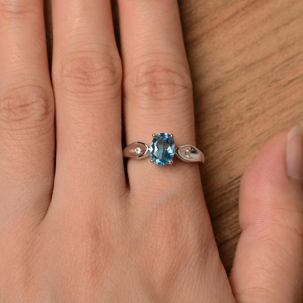 Oval Cut Swiss Blue Topaz Wedding Rings - Palmary