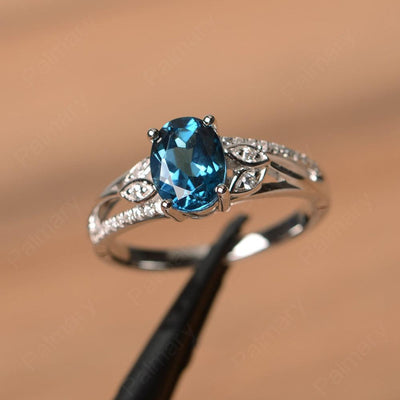 Oval Cut London Blue Topaz Engagement Rings - Palmary