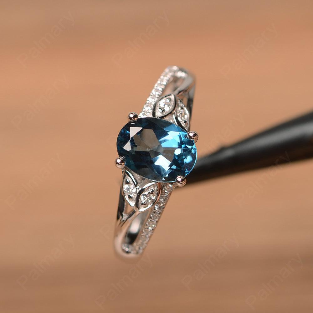 Oval Cut London Blue Topaz Engagement Rings - Palmary
