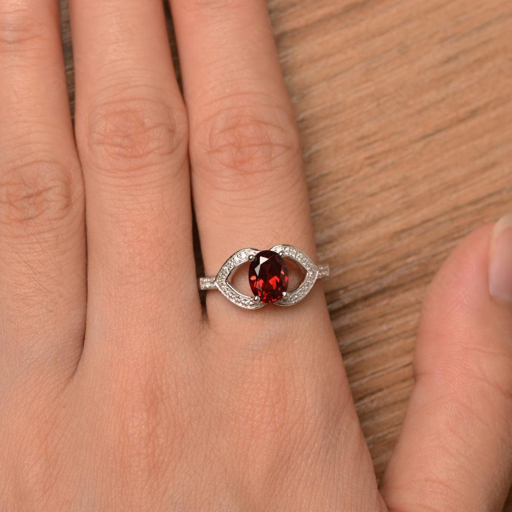 Oval Cut Garnet Split Wedding Rings - Palmary