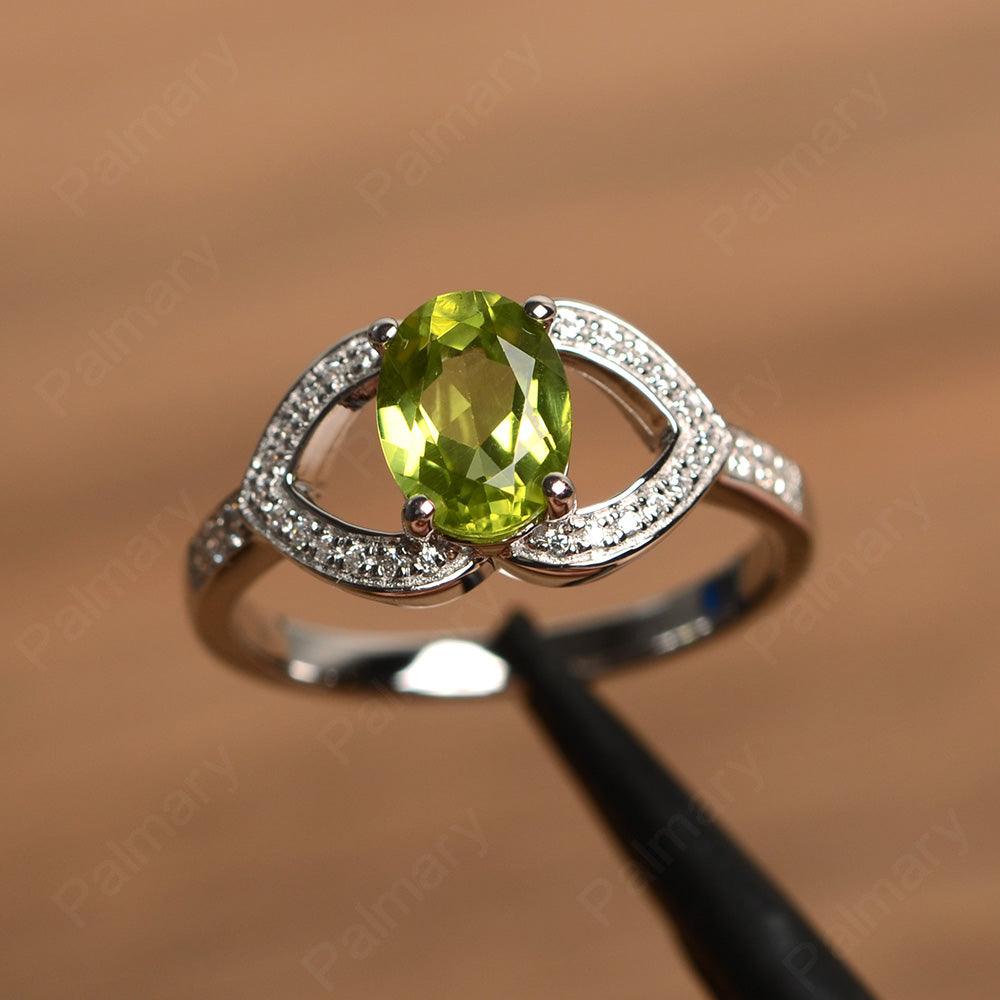 Oval Cut Peridot Split Wedding Rings - Palmary