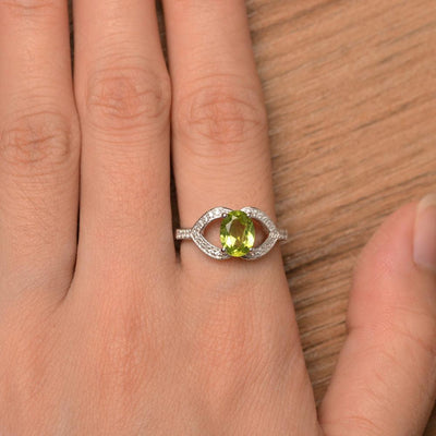 Oval Cut Peridot Split Wedding Rings - Palmary