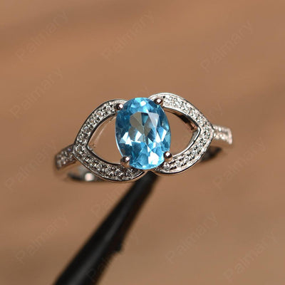 Oval Cut Swiss Blue Topaz Split Wedding Rings - Palmary