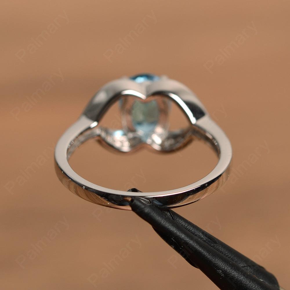 Oval Cut Swiss Blue Topaz Split Wedding Rings - Palmary