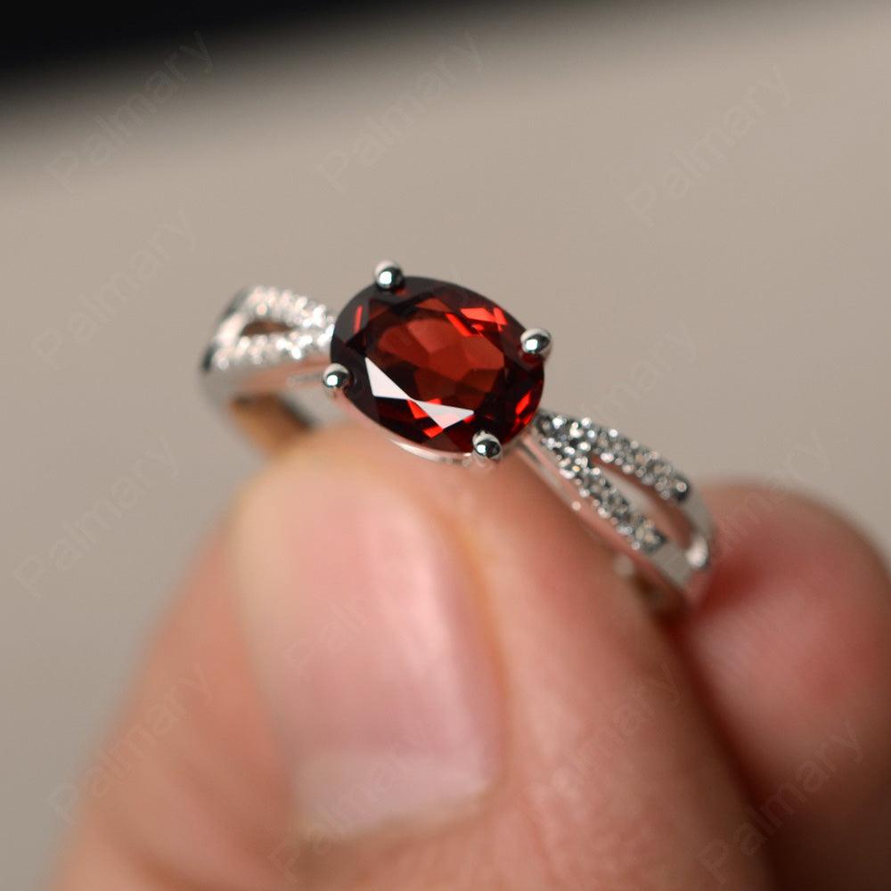 East West Oval Garnet Split Shank Ring - Palmary