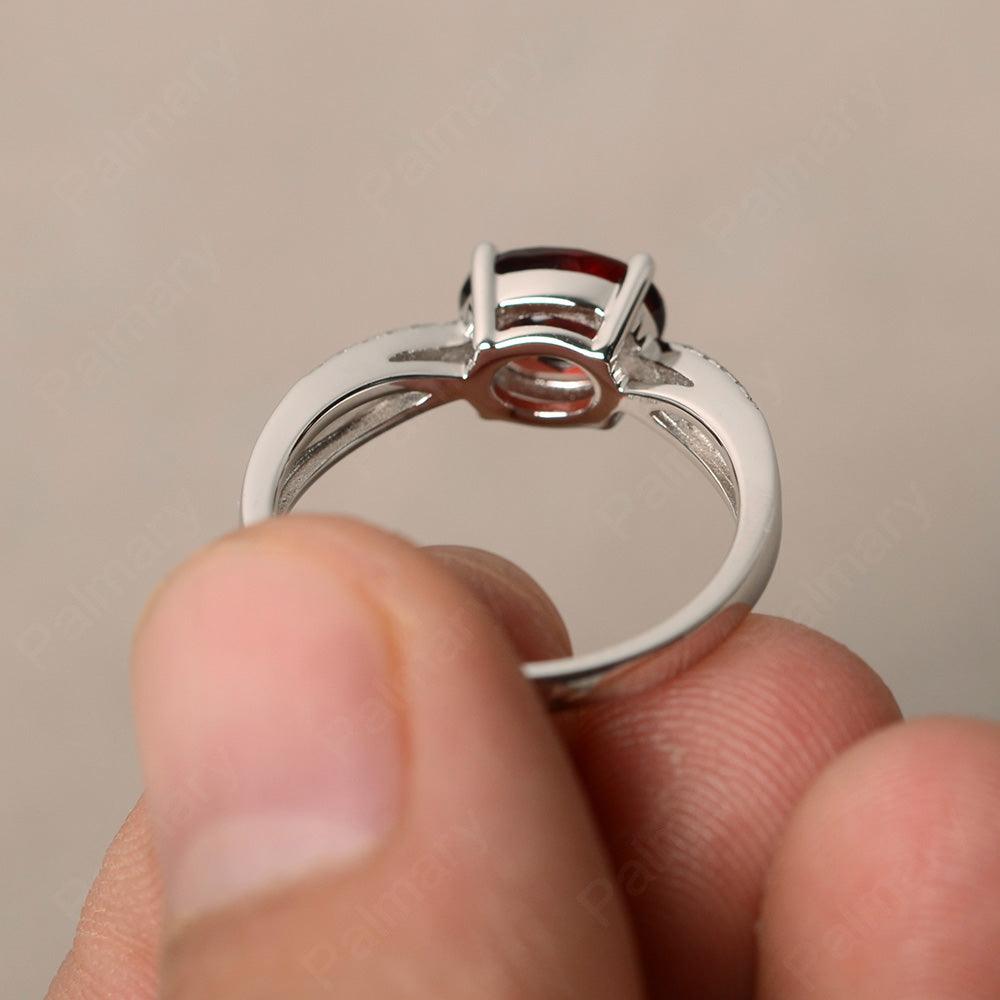 East West Oval Garnet Split Shank Ring - Palmary