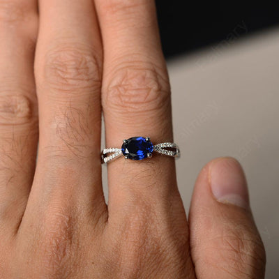 East West Oval Sapphire Split Shank Ring - Palmary