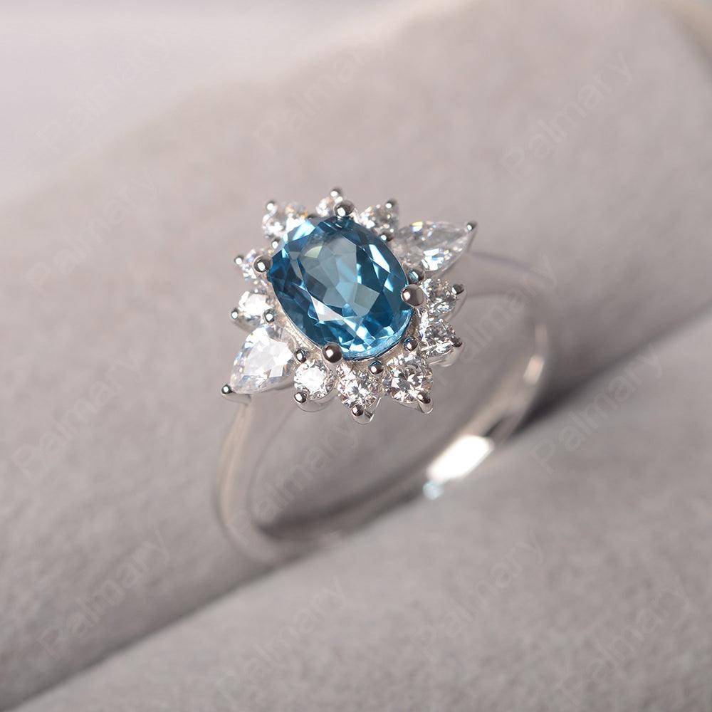 Oval Cut Swiss Blue Topaz Halo Ring Sterling Silver - Palmary