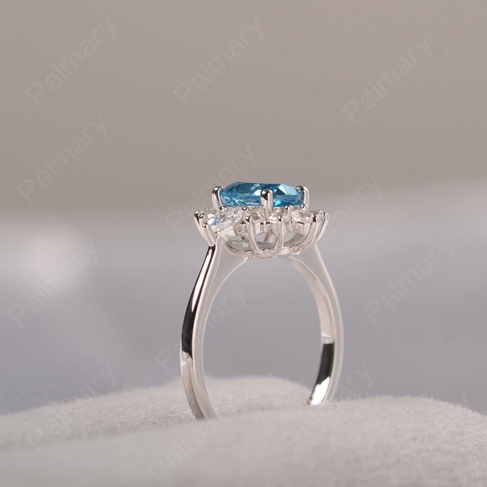 Oval Cut Swiss Blue Topaz Halo Ring Sterling Silver - Palmary