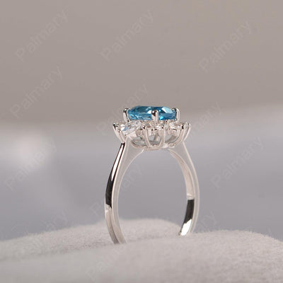 Oval Cut Swiss Blue Topaz Halo Ring Sterling Silver - Palmary