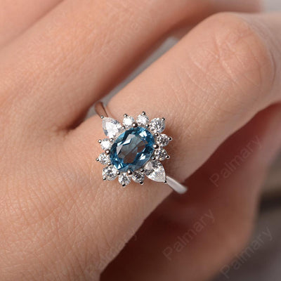 Oval Cut Swiss Blue Topaz Halo Ring Sterling Silver - Palmary