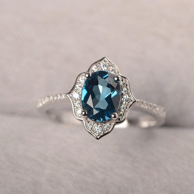 Oval Cut Petal London Blue Topaz Engagement Ring - Palmary