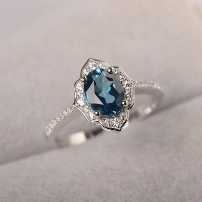 Oval Cut Petal London Blue Topaz Engagement Ring - Palmary