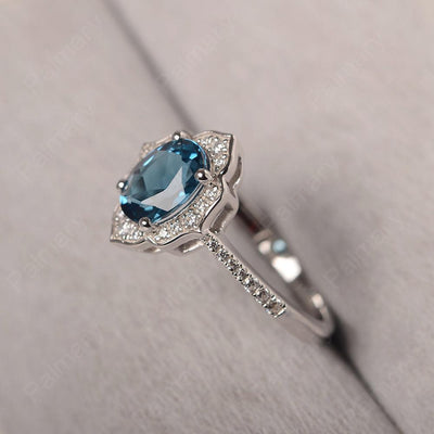 Oval Cut Petal London Blue Topaz Engagement Ring - Palmary