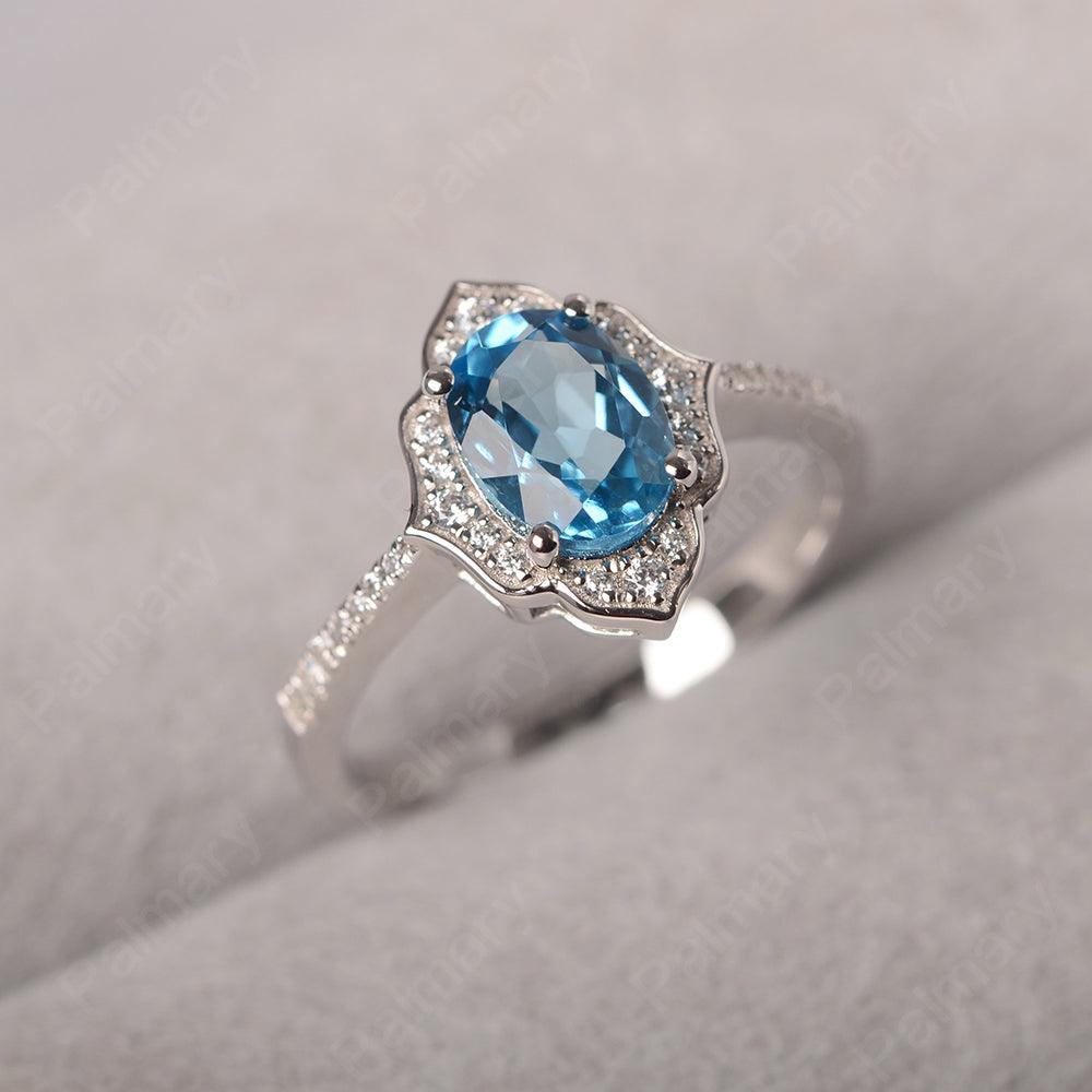 Oval Cut Petal Swiss Blue Topaz Engagement Ring - Palmary