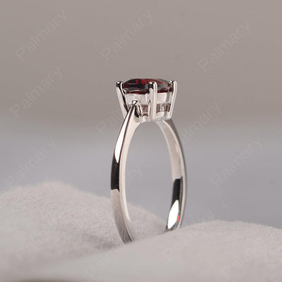 East West Oval Cut Garnet Solitaire Ring - Palmary