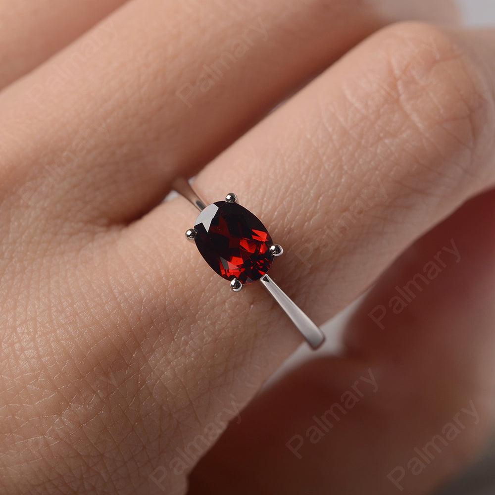 East West Oval Cut Garnet Solitaire Ring - Palmary