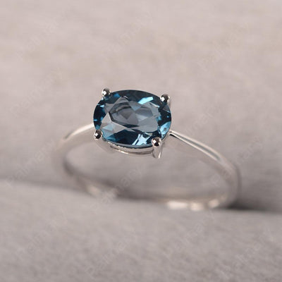 East West Oval Cut London Blue Topaz Solitaire Ring - Palmary