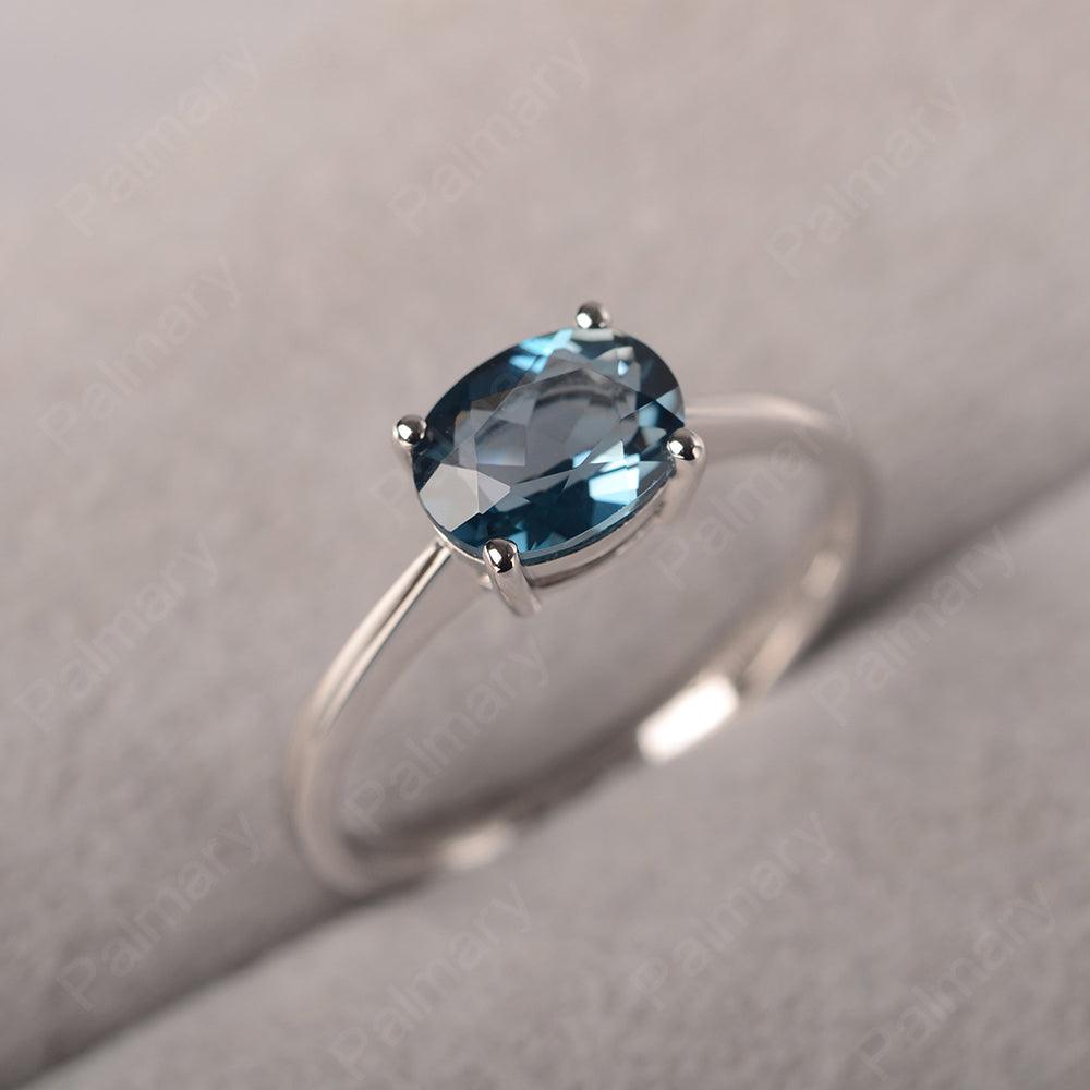 East West Oval Cut London Blue Topaz Solitaire Ring - Palmary