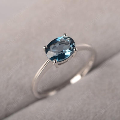 East West Oval Cut London Blue Topaz Solitaire Ring - Palmary
