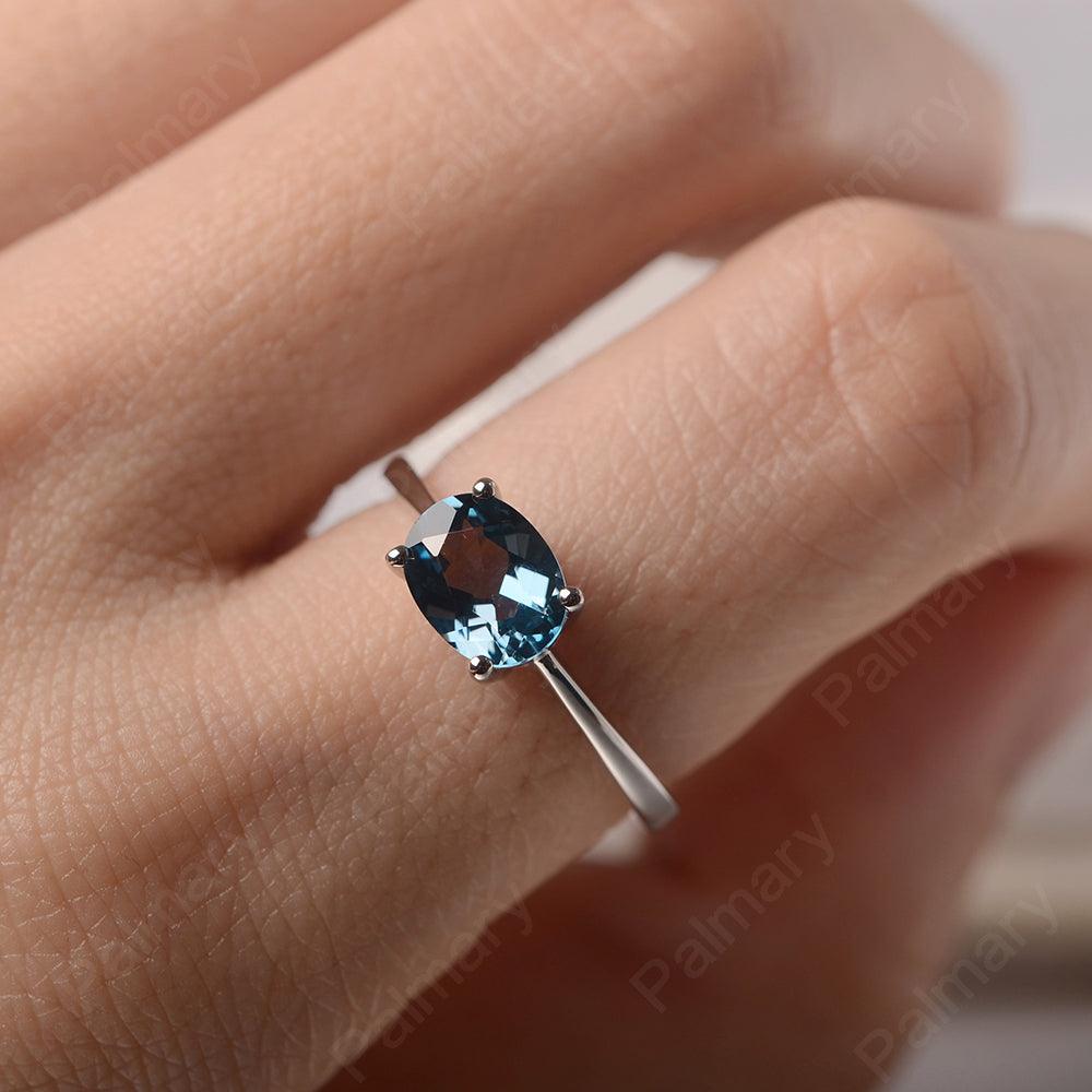 East West Oval Cut London Blue Topaz Solitaire Ring - Palmary