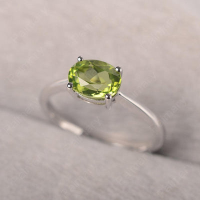East West Oval Cut Peridot Solitaire Ring - Palmary