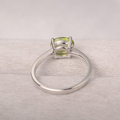 East West Oval Cut Peridot Solitaire Ring - Palmary