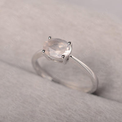 East West Oval Cut Rose Quartz Solitaire Ring - Palmary