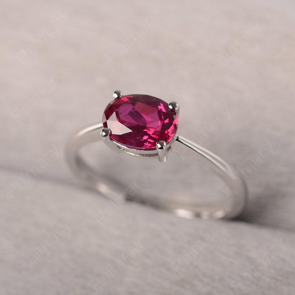 East West Oval Cut Ruby Solitaire Ring - Palmary