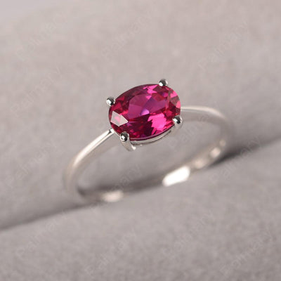 East West Oval Cut Ruby Solitaire Ring - Palmary