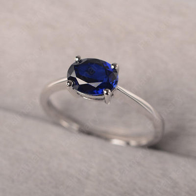 East West Oval Cut Sapphire Solitaire Ring - Palmary
