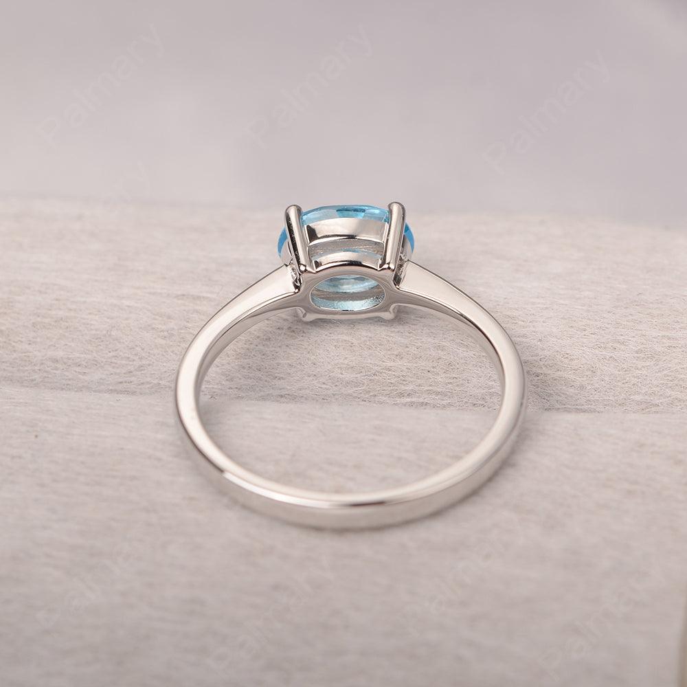 East West Oval Cut Swiss Blue Topaz Solitaire Ring - Palmary