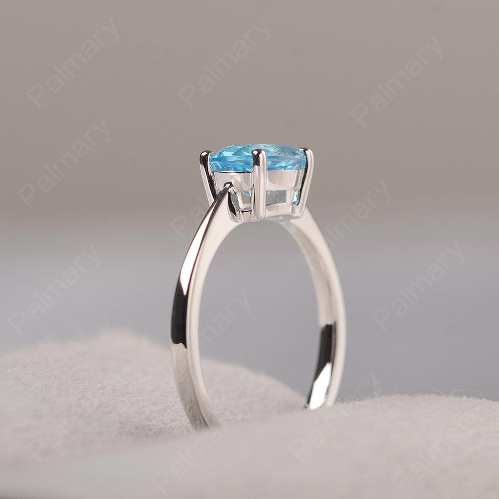 East West Oval Cut Swiss Blue Topaz Solitaire Ring - Palmary