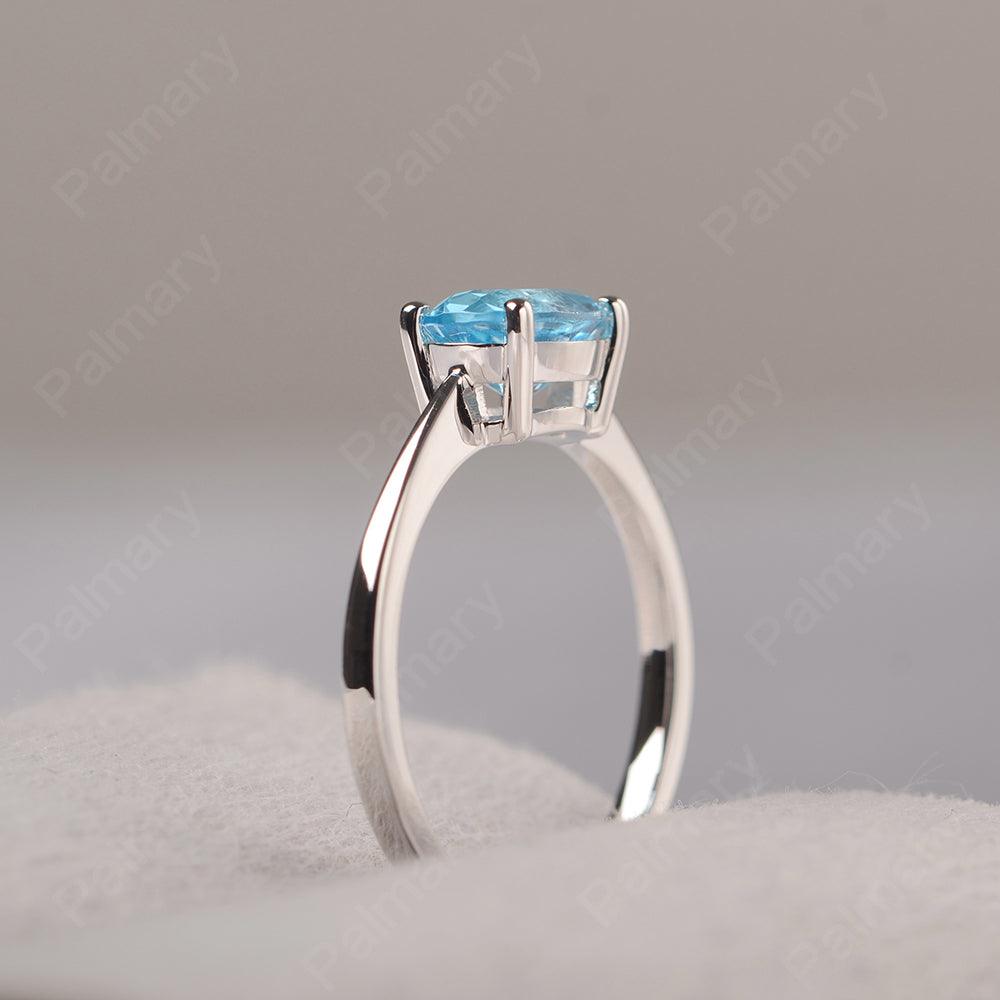 East West Oval Cut Swiss Blue Topaz Solitaire Ring - Palmary