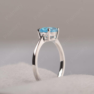 East West Oval Cut Swiss Blue Topaz Solitaire Ring - Palmary