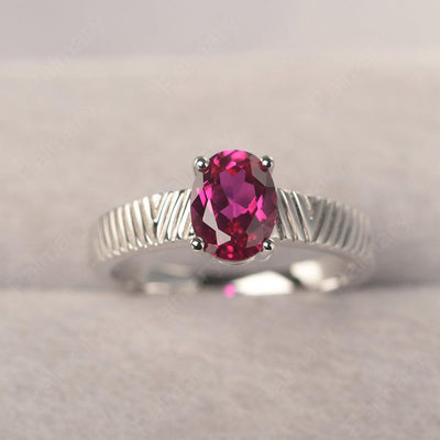 Oval Cut Wide Band Ruby Ring - Palmary