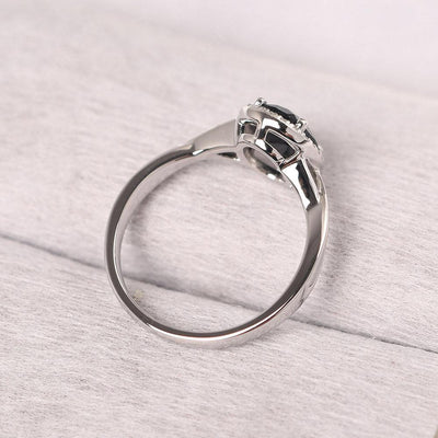 Oval Shaped Black Spinel Halo Engagement Ring - Palmary