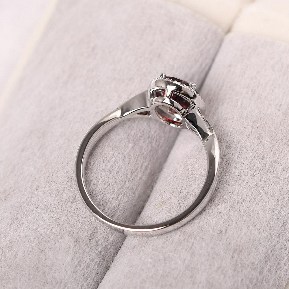 Oval Shaped Garnet Halo Engagement Ring - Palmary
