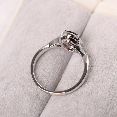 Oval Shaped Garnet Halo Engagement Ring - Palmary